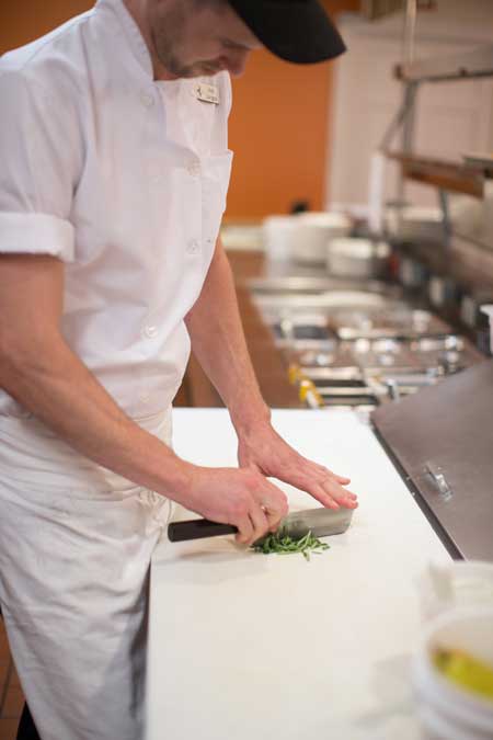 chef cutting up spices